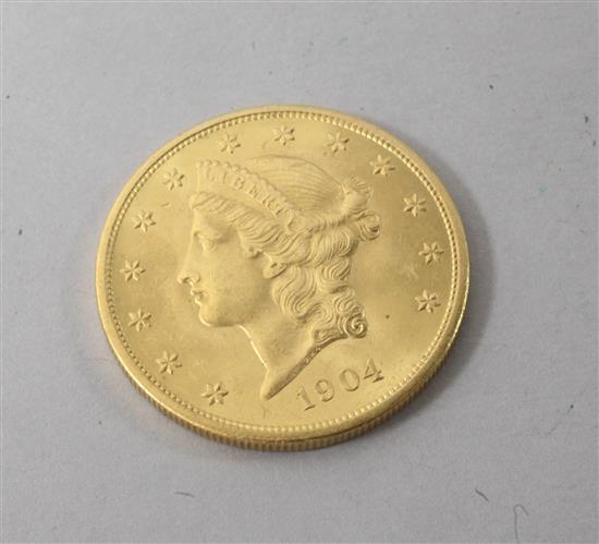 A 1904 US Liberty twenty dollar gold coin, GVF.
